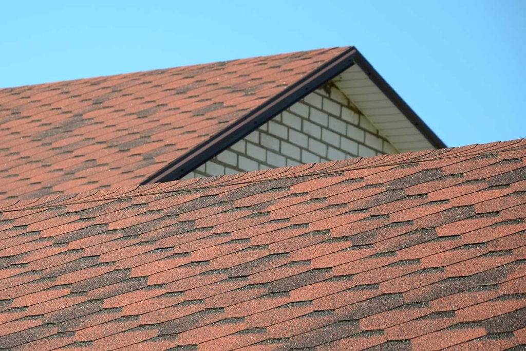 inspecting a roof for leaks, damage, and problems